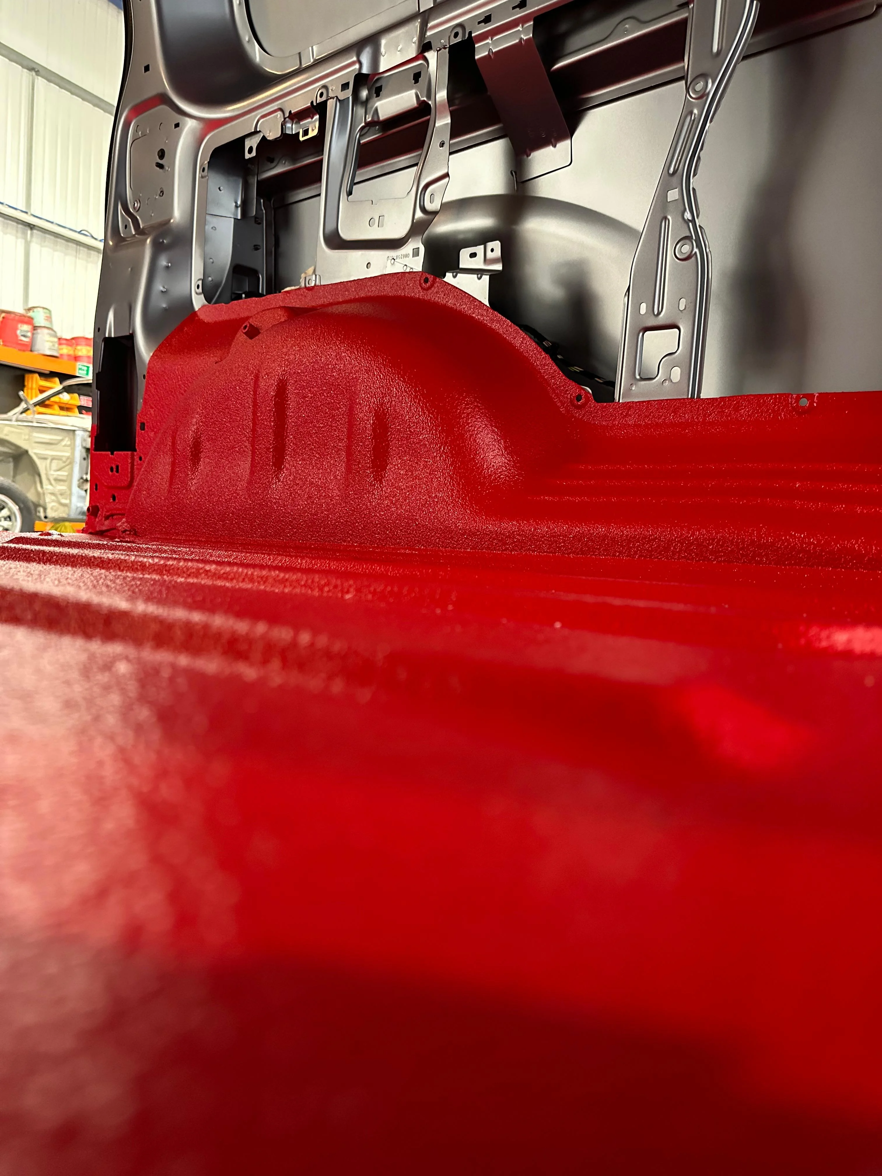 Detailed textured finish of Speedliner spray-on vehicle lining